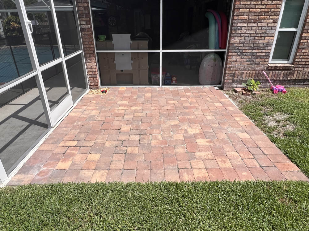 Paver patio in need of restoration before Stellar Paver Sealing Services in Brevard County