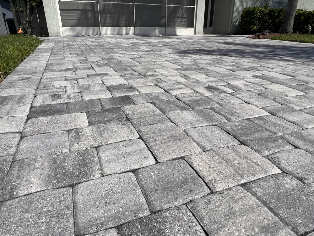 wet look on paver driveway by Stellar Paver Sealing in Brevard County